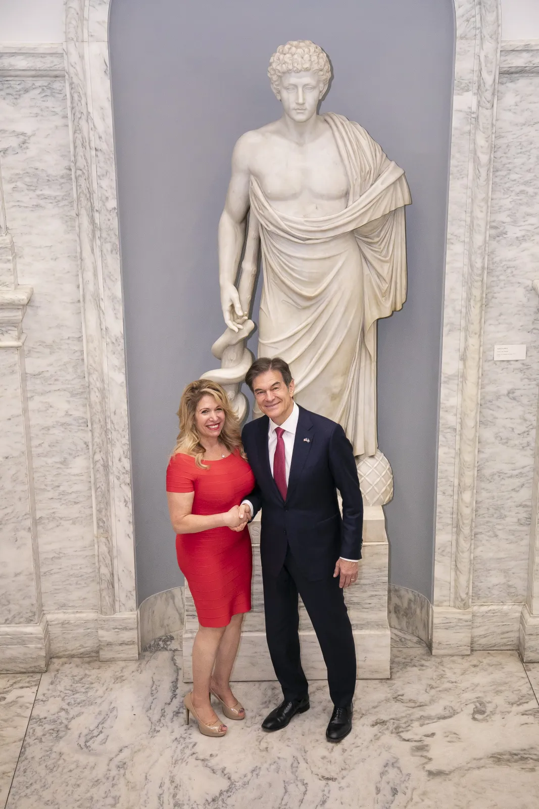 Penny Foskaris sharing the stage with Dr. Oz